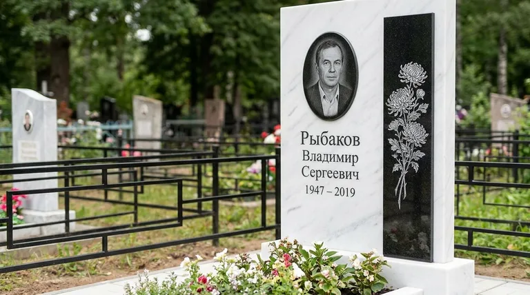 Памятник с гравировкой хризантем — выполненная работа «Рыбаков» в Норильске