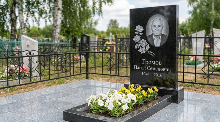 Памятник с гравировкой хризантем — выполненная работа «Громов» в Норильске