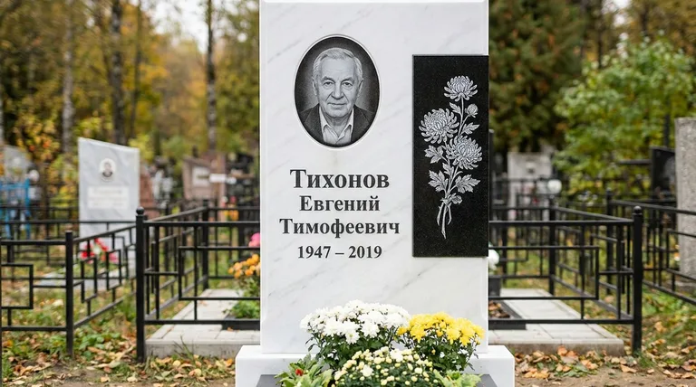 Памятник с гравировкой хризантем — выполненная работа «Тихонов» в Норильске