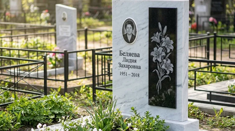 Памятник с гравировкой лилий — выполненная работа «Беляева» в Норильске