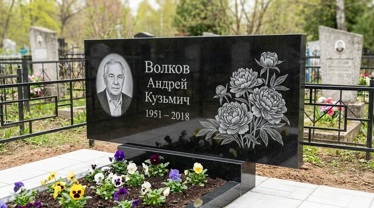 Памятник с гравировкой пионов — выполненная работа «Волков» в Норильске