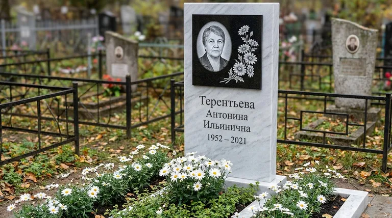Памятник с гравировкой ромашек — выполненная работа «Терентьева» в Норильске