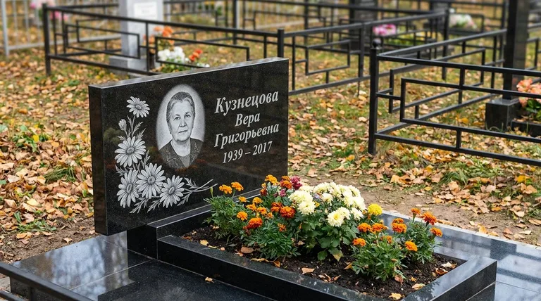 Памятник с гравировкой ромашек — выполненная работа «Кузнецова» в Норильске