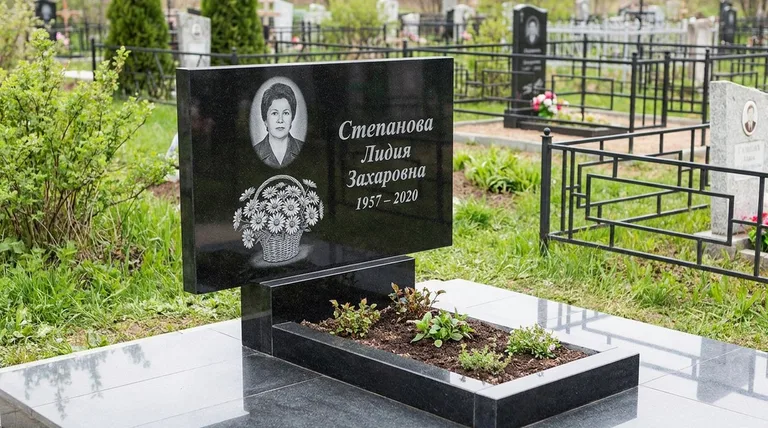 Памятник с гравировкой ромашек — выполненная работа «Степанова» в Норильске